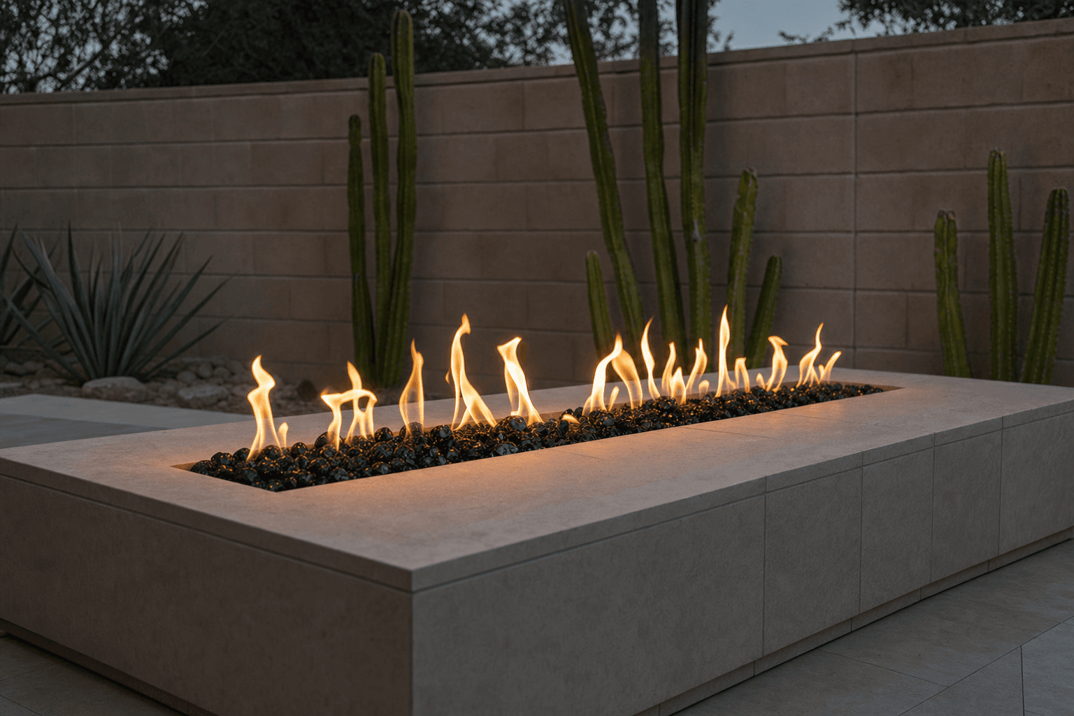 Linear fire feature beside a pool